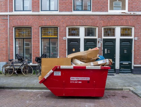 Professional home clearance in London with removal team in a property