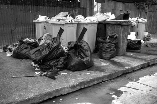 Waste removal team clearing rubbish from a London estate