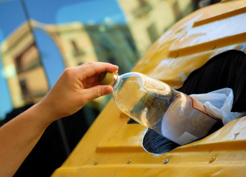 Waste clearance team removing household rubbish in London
