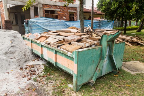 Bed disposal service handling bulky bed frame removal in a London home