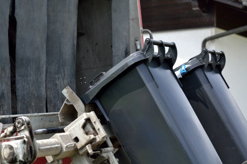 Sofa collection in London showing careful furniture loading into a removal vehicle