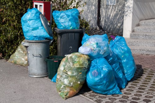 Collection of mixed household rubbish loaded for transparent pricing example