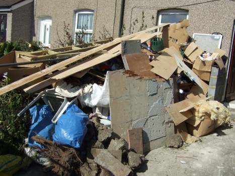 Truck space measurement illustrating load-based and cubic-yard rubbish rates